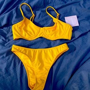 New never worn before Kittenish bathing suit. Medium too small bottom.